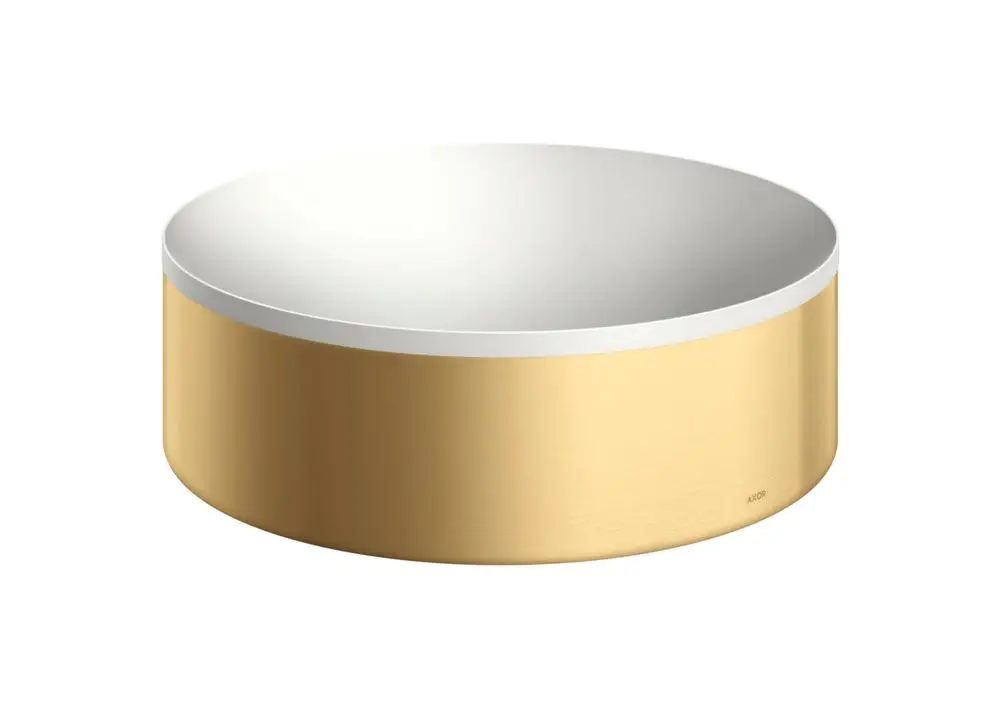 Rundes Waschbecken mit einer glänzenden weißen Innenfläche und einer gebürsteten goldenen Außenfläche, hergestellt von AXOR.